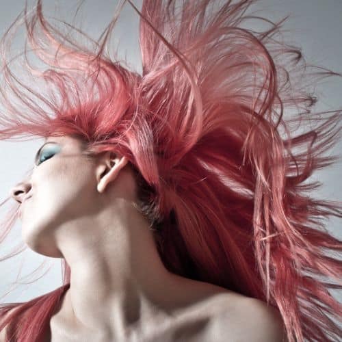 Woman Shaking Pink Hair