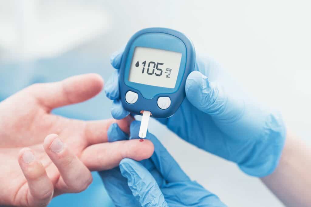 Diabetic Checking Blood Sugar